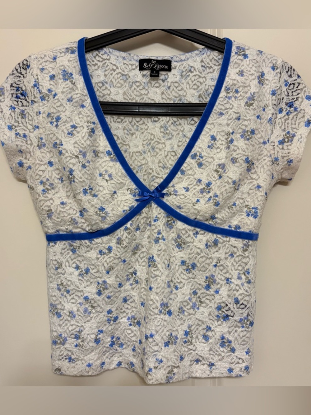 Self Esteem White Lace Top with Blue Trim and Floral Accents